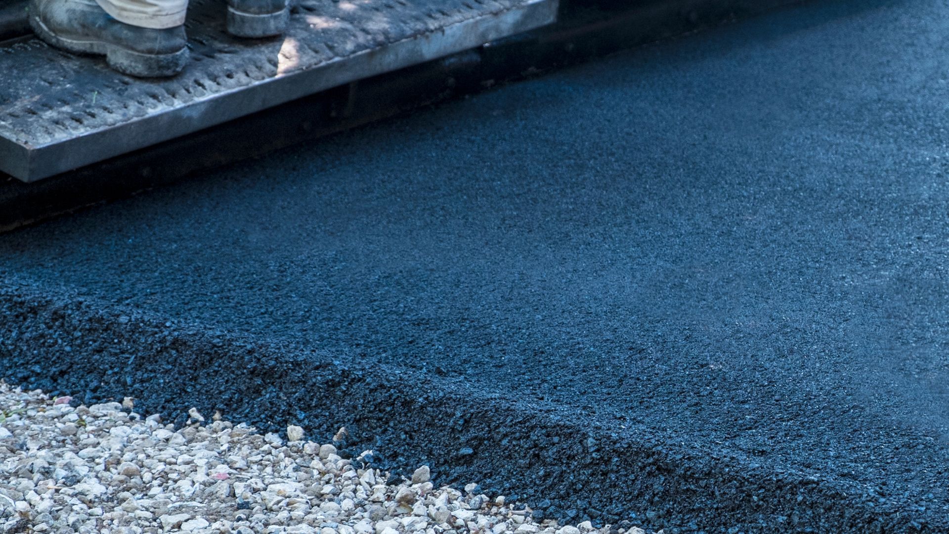 Asphalt vs. Concrete: Which is Better for Your RI Driveway?